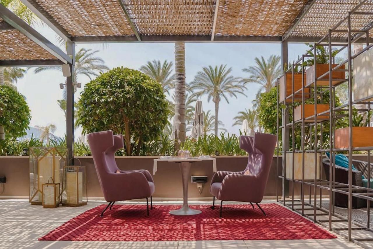 Aguas De Ibiza Grand Luxe Hotel - Small Luxury Hotel Of The World Santa Eularia des Riu Esterno foto The rooftop terrace at the hotel