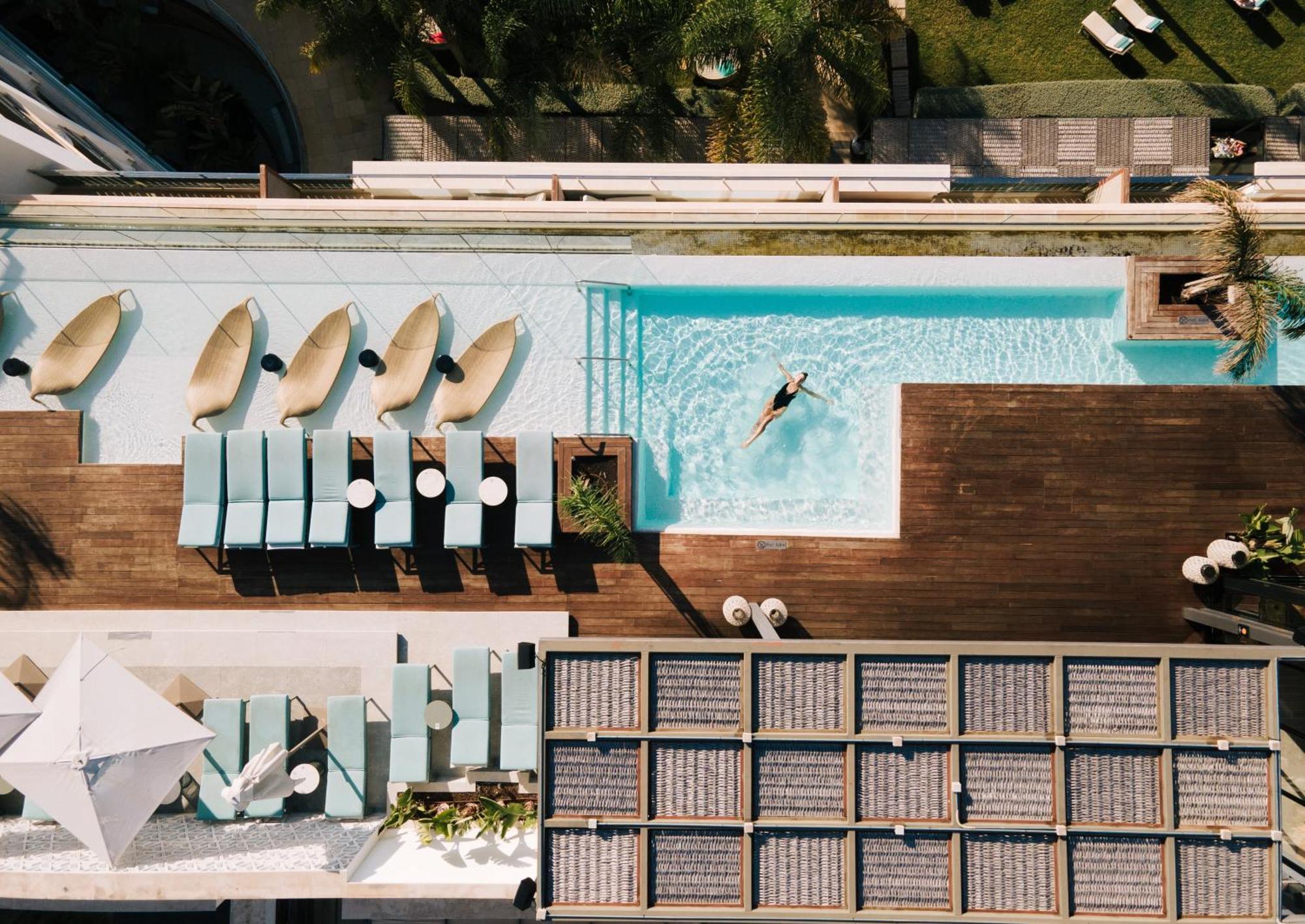 Aguas De Ibiza Grand Luxe Hotel - Small Luxury Hotel Of The World Santa Eularia des Riu Esterno foto The rooftop pool at the hotel
